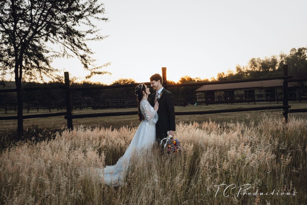 a man and woman in a field At God's Gift Events